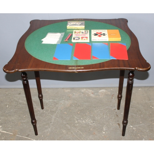 163 - An antique style folding card or games table with baize lined interior, approx 79cm wide x 79cm deep... 