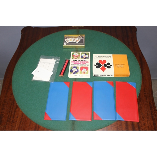 163 - An antique style folding card or games table with baize lined interior, approx 79cm wide x 79cm deep... 