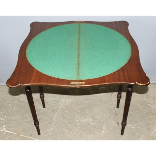 163 - An antique style folding card or games table with baize lined interior, approx 79cm wide x 79cm deep... 