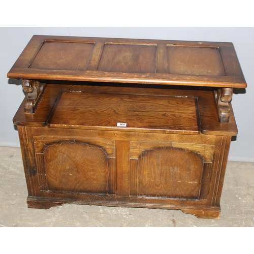 164 - A vintage carved oak Monk's bench or storage box with lion supports, approx 96cm wide x 42cm deep x ... 