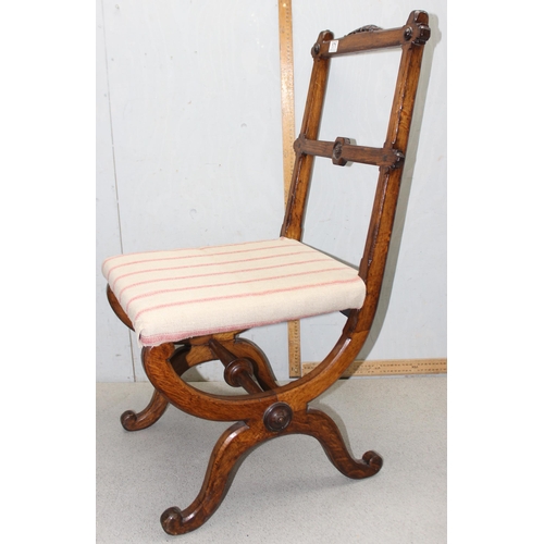 171 - 19c oak Pugin inspired cross framed chair with central turned stretcher and carvings to back rest ra... 