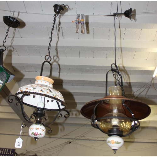 252 - 2 large wrought iron and pottery hanging lamps