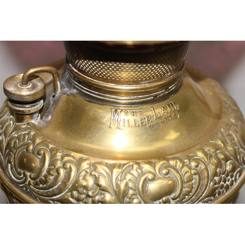 254 - A Victorian tall decorative brass and copper American “Miller” oil lamp converted to electricity wit... 