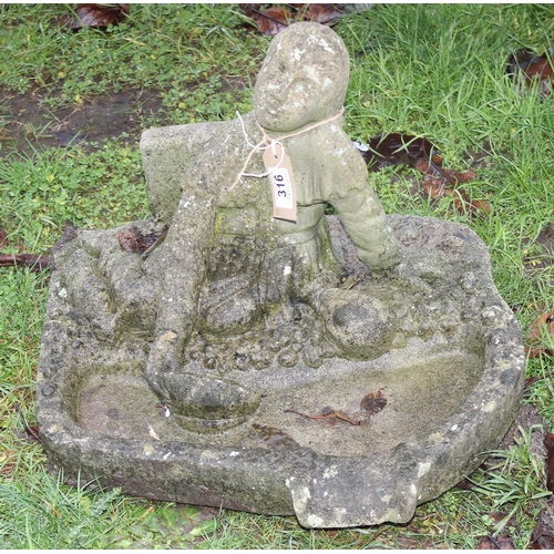 316 - A weathered concrete birdbath formed as a seated male, approx 48cm wide