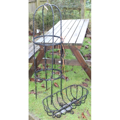 318 - A wrought iron planter basket and a garden obelisk, the obelisk approx 144cm tall