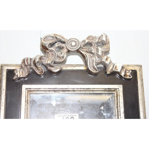 492 - Rectangular decorative wall mirror with silvered ribbon bow moulding to top, approx 160cm x 24cm