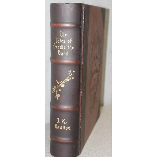 543 - Leather and jewelled metal mounted presentation 1st edition of “Tales of Beedle the Bard” by J.K. Ro... 