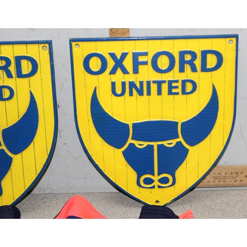 717 - Two large cast metal Oxford United wall plaques in team colours, approx 26cm x 30cm & AFC Bournemout... 