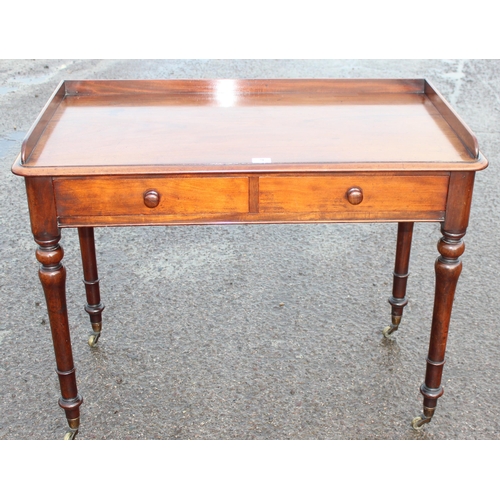 9 - A 19th century Howard & Sons 2 drawer mahogany side table the drawers stamped Howard & Sons Berners ... 