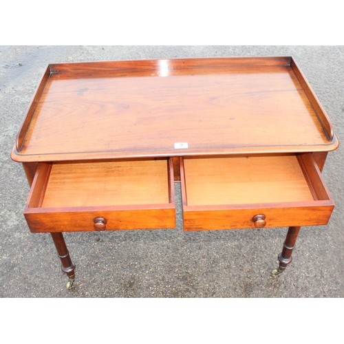 9 - A 19th century Howard & Sons 2 drawer mahogany side table the drawers stamped Howard & Sons Berners ... 