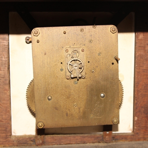 1338 - An unusual antique oak table top collectors cabinet with mechanical clock approx. 35cm tall