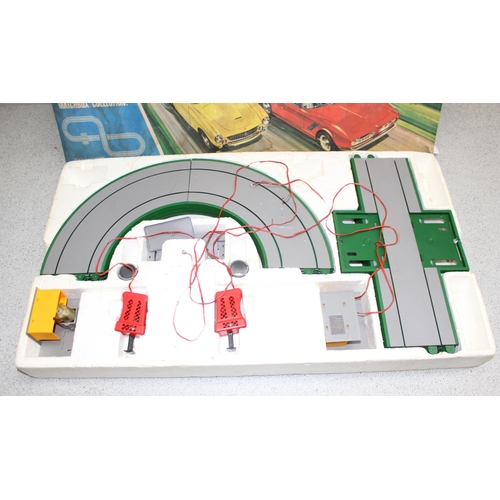 1553 - Vintage games - boxed Munro International Football, M-2 Matchbox Motorised Motorway, and an Airfix 1... 