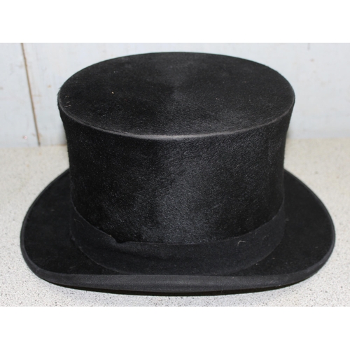 215 - Carswell of Glasgow black silk top hat size 7 1/8 with date stamp for 1942 in fitted leather case, a... 