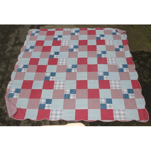 219 - A vintage patchwork quilt by Forever England, approx 256cm x 240cm