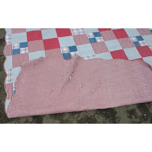 219 - A vintage patchwork quilt by Forever England, approx 256cm x 240cm