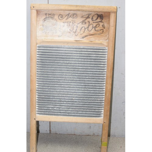 1877 - A vintage wooden and metal washboard 