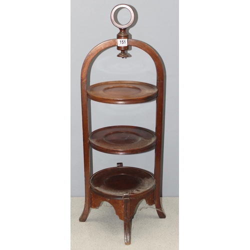 151 - An antique style mahogany 3 tier cake stand, approx 26cm x 82cm tall