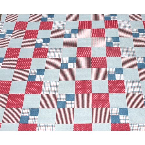 219 - A vintage patchwork quilt by Forever England, approx 256cm x 240cm