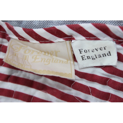 219 - A vintage patchwork quilt by Forever England, approx 256cm x 240cm