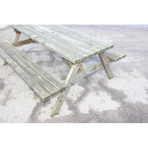 305 - A modern garden picnic bench by MC Timber, approx 180cm wide x 150cm deep x 72cm tall