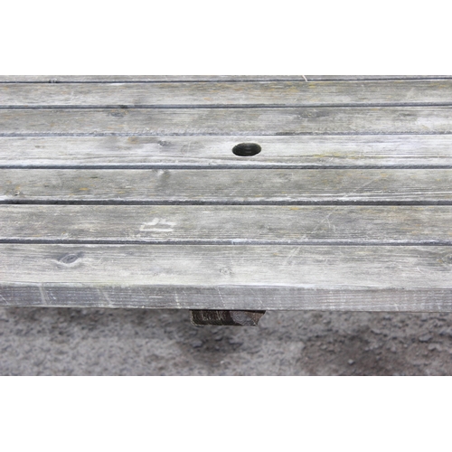 305 - A modern garden picnic bench by MC Timber, approx 180cm wide x 150cm deep x 72cm tall