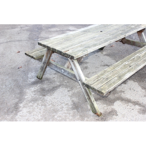 306 - A modern garden picnic bench by MC Timber, approx 180cm wide x 150cm deep x 72cm tall