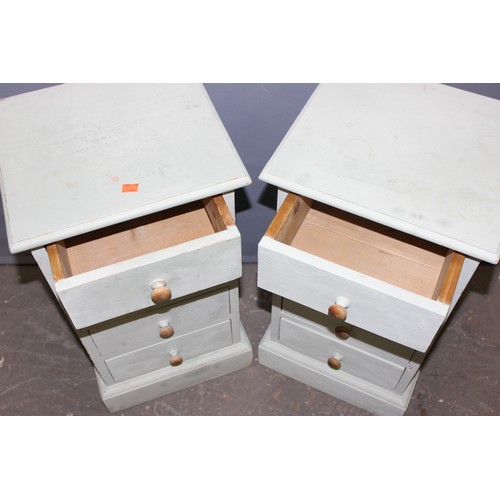 28 - A pair of white painted pine 4 drawer bedside cabinets, each approx 35cm wide x 32cm deep x 67cm tal... 