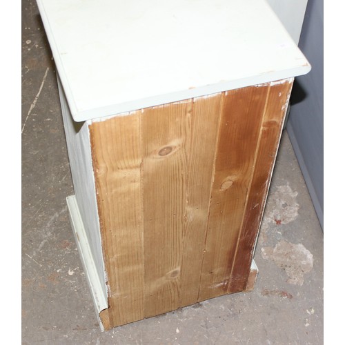 28 - A pair of white painted pine 4 drawer bedside cabinets, each approx 35cm wide x 32cm deep x 67cm tal... 