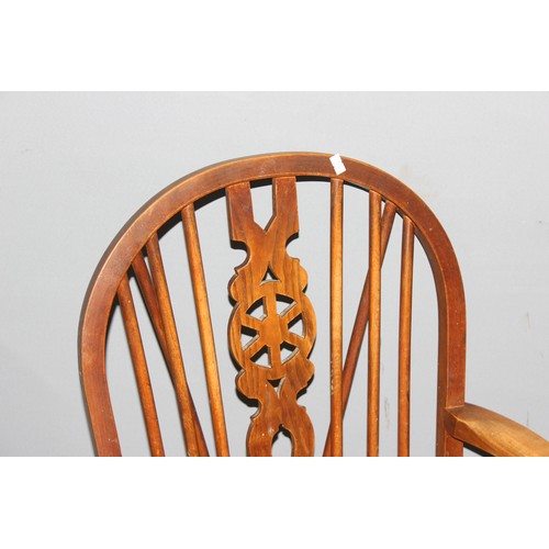 31 - A vintage wheel back kitchen armchair