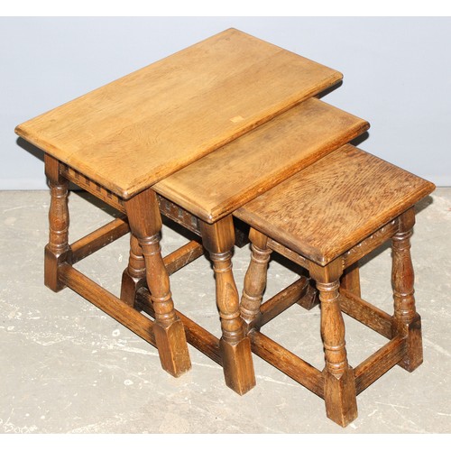 32 - Vintage oak nest of 3 tables, the largest approx 61cm wide x 34cm deep x 46cm tall