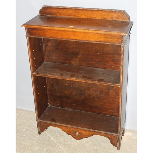 34 - A small early 20th century oak bookcase with beaded edging, approx 77cm wide x 27cm deep x 105cm tal... 