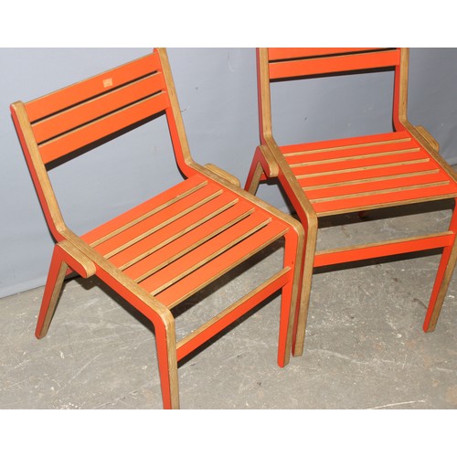 35 - A pair of unusual retro red painted bent plywood chairs