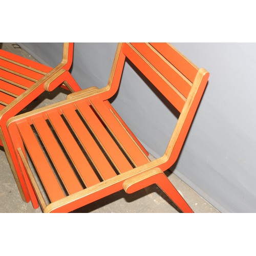 35 - A pair of unusual retro red painted bent plywood chairs