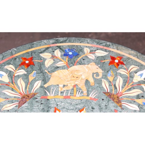 97 - A high decorative marble topped table with cast iron base, the marble top with Pietra Dura inlay lik... 