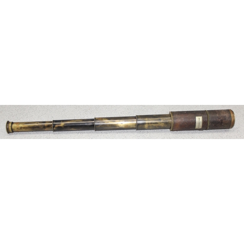 668 - A vintage 4 drawer brass and leather telescope with applied name plaque for W.E. Harvey, seemingly n... 