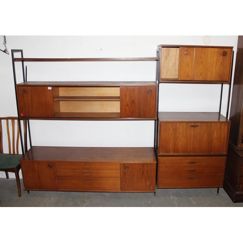 98 - A retro mid-century Avalon modular wall unit, 5 various cupboards and shelf, approx 249cm wide x 44c... 