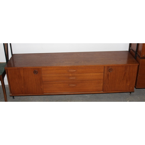 98 - A retro mid-century Avalon modular wall unit, 5 various cupboards and shelf, approx 249cm wide x 44c... 