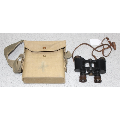 1460 - A pair of WW2 period 8x26 No 214 binoculars in 1941 dated canvas case, binoculars with broad arrow m... 