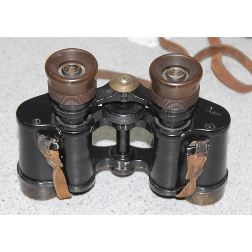 1460 - A pair of WW2 period 8x26 No 214 binoculars in 1941 dated canvas case, binoculars with broad arrow m... 