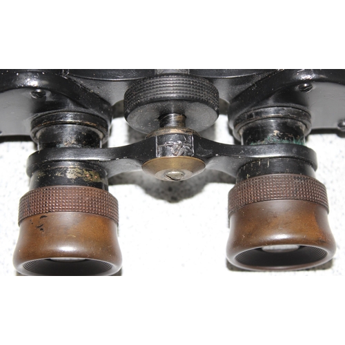 1460 - A pair of WW2 period 8x26 No 214 binoculars in 1941 dated canvas case, binoculars with broad arrow m... 