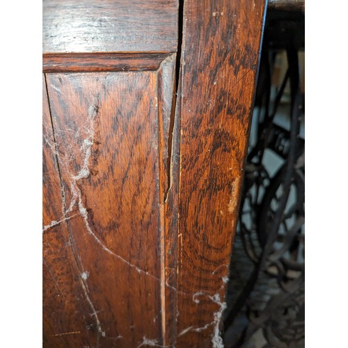 18 - An antique oak roll top desk with tambour front, approx 127cm wide x 76cm deep x 126cm tall