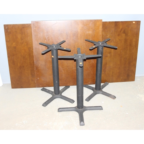 98 - 3 metal base and square topped café or restaurant tables, each approx 90cm square x 73cm tall, no fi... 
