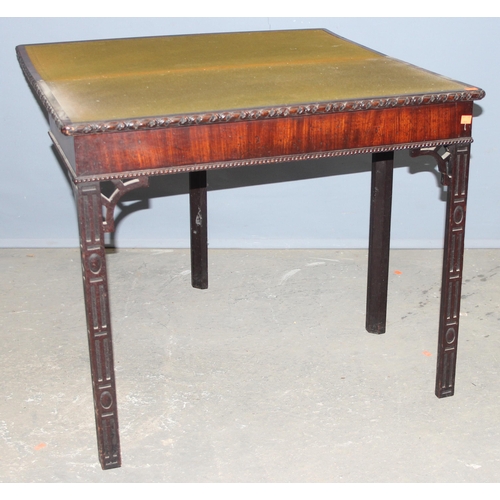 57 - A late 19th century Chippendale Revival period mahogany fold over card table, approx 83cm wide x 83c... 