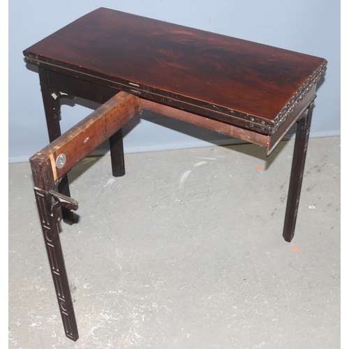 57 - A late 19th century Chippendale Revival period mahogany fold over card table, approx 83cm wide x 83c... 
