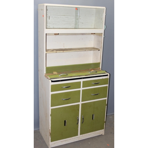 24 - A mid-century kitchen cupboard, white and green painted with pull out enamel slide, approx 82cm wide... 