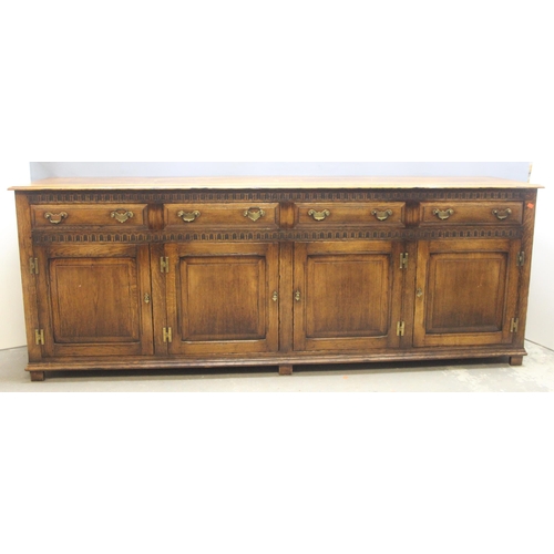 47 - A Georgian style oak sideboard, 4 drawers over 4 cupboards with 4 keys, approx 221cm wide x 51cm dee... 