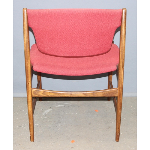69 - A pair of retro dining chairs with red/ pink upholstery, likely G-Plan but no label