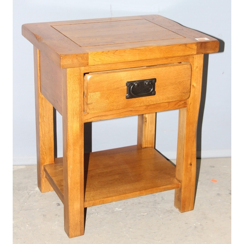 32 - A good quality modern light oak bedside table with iron handle, likely Oak Furnitureland, approx 50c... 