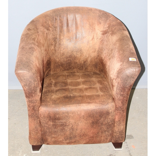 51 - A modern distressed suede tub chair
