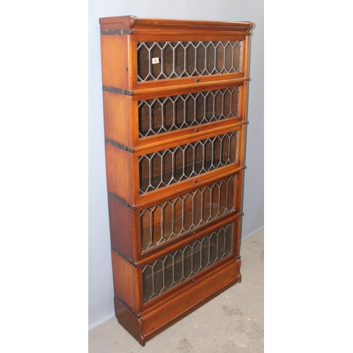 146 - An early 20th century mahogany Globe Wernicke style bookcase with leaded glass panels, 5 tiers with ... 